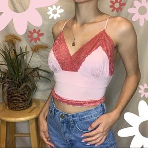 Adorable baby pink y2k cami top with lace details around the chest size L